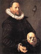 Portrait of a Man Holding a Skull s